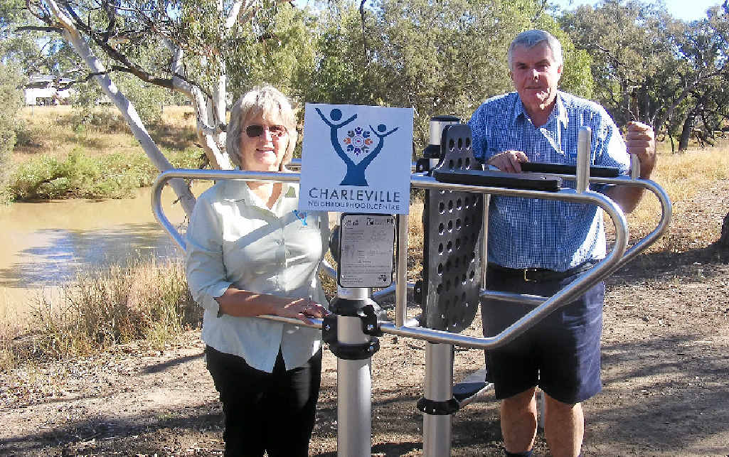 GET FIT: Charleville Neighbourhood Centre co-ordinator Anne O’Brien and committee member Michael Moore test out the new equipment along the Warrego River walk. GET FIT: Charleville Neighbourhood Centre co-ordinator Anne O’Brien and committee member Michael Moore test out the new equipment along the Warrego River walk.