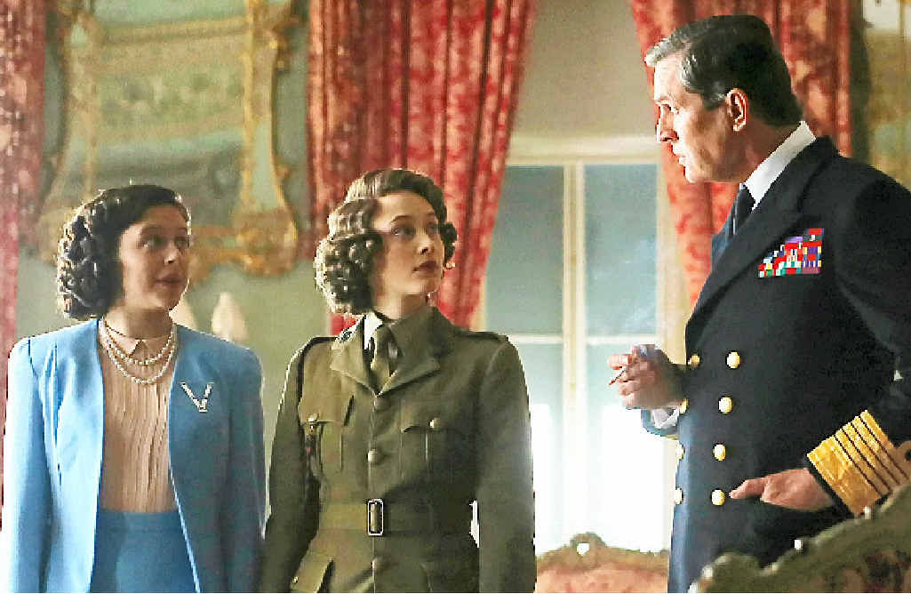 Bel Powley, left, Sarah Gadon and Rupert Everett in a scene from the movie A Royal Night Out. Bel Powley, left, Sarah Gadon and Rupert Everett in a scene from the movie A Royal Night Out.