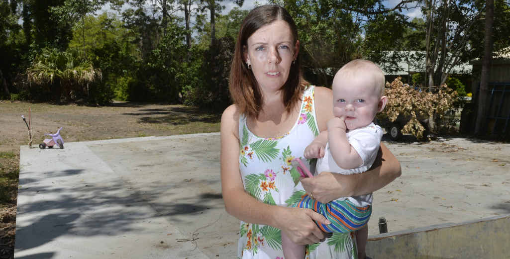 LET DOWN: Chantelle Darrell, pictured with son Ollie, and her husband Scott are more than $25,000 out of pocket for a shed that was never delivered. LET DOWN: Chantelle Darrell, pictured with son Ollie, and her husband Scott are more than $25,000 out of pocket for a shed that was never delivered.
