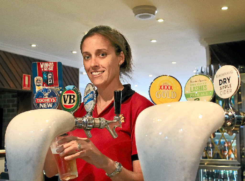 NEW IMAGE: Katie Faber, second-in-charge at the Ballina Hotel, behind the bar. NEW IMAGE: Katie Faber, second-in-charge at the Ballina Hotel, behind the bar.
