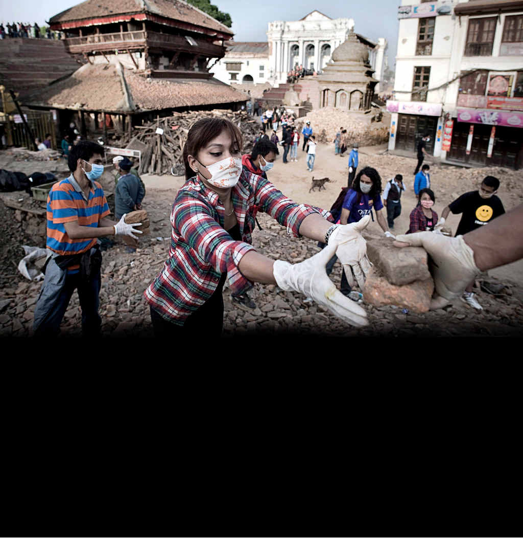 Nepalese people clear rubble at the Basantapur Durbar Square in Kathmandu after a 7.8 magnitude earthquake struck the Himalayan nation on April 25. Nepalese people clear rubble at the Basantapur Durbar Square in Kathmandu after a 7.8 magnitude earthquake struck the Himalayan nation on April 25.