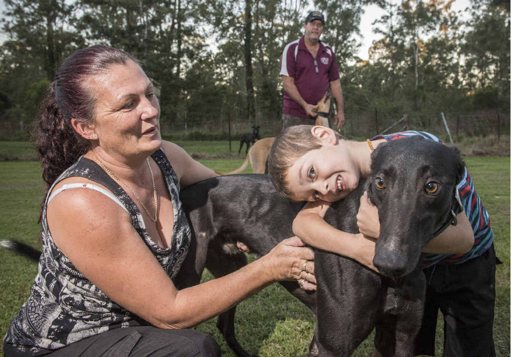 FURRY FRIEND: Trainers Sonia and Warren Kempshall with son Jasper, 4, and their greyhound Slick Jappa, one of their ‘pets’. FURRY FRIEND: Trainers Sonia and Warren Kempshall with son Jasper, 4, and their greyhound Slick Jappa, one of their ‘pets’.