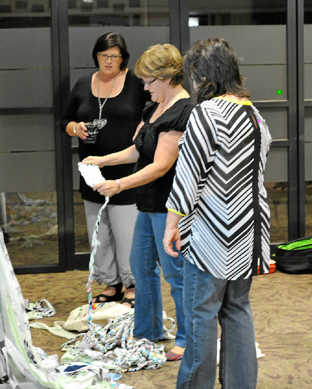 CHALLENGE ACCEPTED: The ladies at the Creative Recycling Centre have started their first project as an attempt at Australia’s largest recycled rug. CHALLENGE ACCEPTED: The ladies at the Creative Recycling Centre have started their first project as an attempt at Australia’s largest recycled rug.