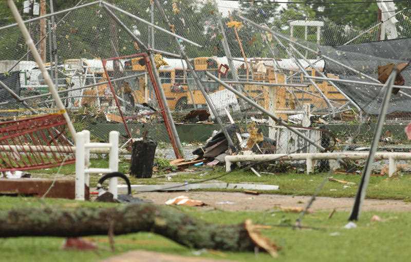 Downed tree and debris from Van, Texas is scattered around the town Monday, May 11, 2015, after severe weather pushed through the area in the early morning hours. Emergency responders searched through splintered wreckage Monday after a line of tornadoes battered several small communities in Texas and Arkansas, killing at least five people. Downed tree and debris from Van, Texas is scattered around the town Monday, May 11, 2015, after severe weather pushed through the area in the early morning hours. Emergency responders searched through splintered wreckage Monday after a line of tornadoes battered several small communities in Texas and Arkansas, killing at least five people.