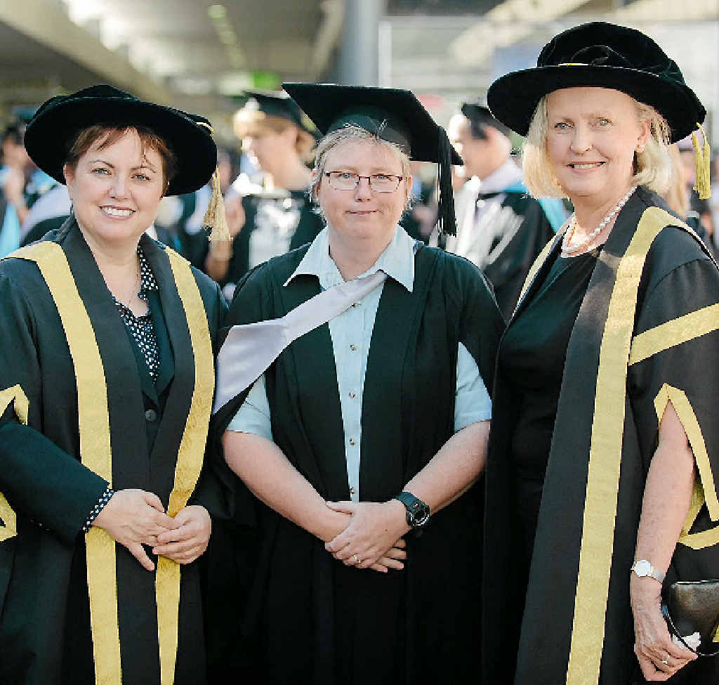 PASSION FOR TEACHING: Leah Campbell (centre) graduating at the University of Southern Queensland. PASSION FOR TEACHING: Leah Campbell (centre) graduating at the University of Southern Queensland.