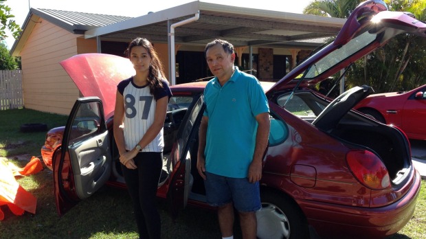 Jasmine Reyes and her father Carlos Reyes in Major Street, Deception Bay: 'We've never had flooding here before.' Jasmine Reyes and her father Carlos Reyes in Major Street, Deception Bay: 'We've never had flooding here before.'