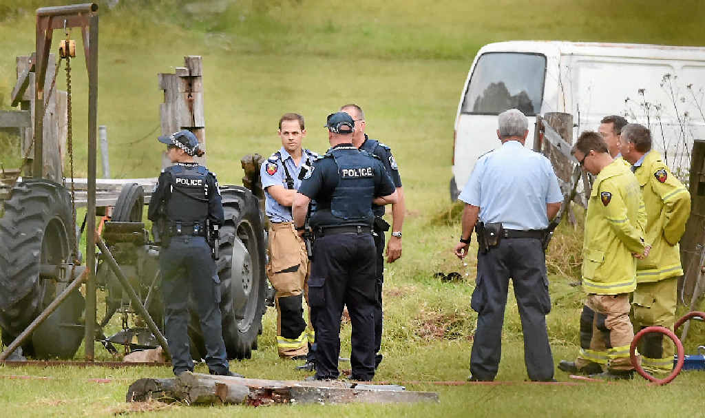 TRAGIC ACCIDENT: Police and emergency services at the scene of a tractor accident on a property on Teddington Road in Tinana on Saturday. TRAGIC ACCIDENT: Police and emergency services at the scene of a tractor accident on a property on Teddington Road in Tinana on Saturday.