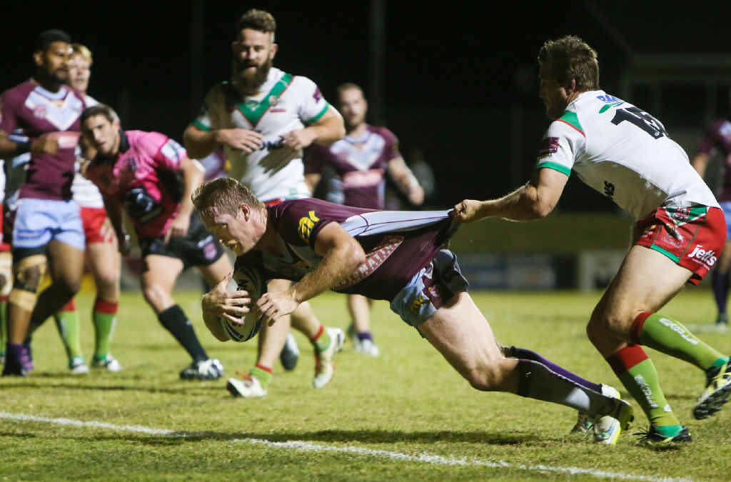 BARNSTORMING: CQ Capras captain Guy Williams charges over against the Wynnum Manly Seagulls at Marley Brown Oval on Saturday night. BARNSTORMING: CQ Capras captain Guy Williams charges over against the Wynnum Manly Seagulls at Marley Brown Oval on Saturday night.