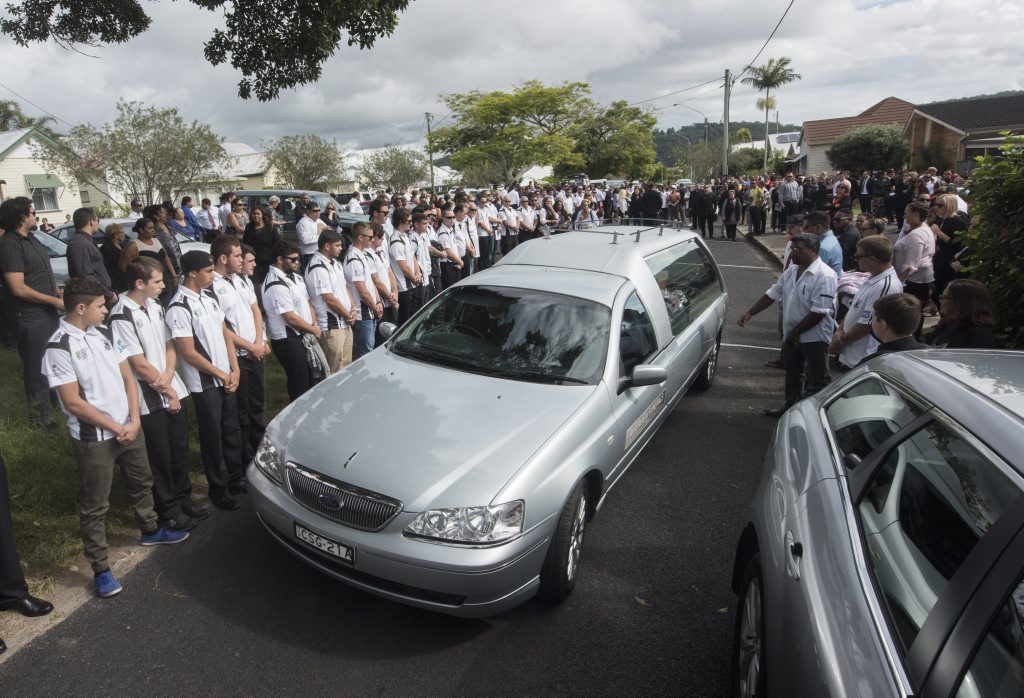 Zane Purcell's coffin is driven away from the Anglican church in Maclean through a guard of honour after his funeral. Photo Adam Hourigan / The Daily Examiner Zane Purcell's coffin is driven away from the Anglican church in Maclean through a guard of honour after his funeral. Photo Adam Hourigan / The Daily Examiner