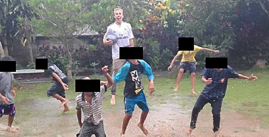 HAPPY PHOTO: Oliver Bridgeman’s Facebook page shows him playing football with children in Bali. HAPPY PHOTO: Oliver Bridgeman’s Facebook page shows him playing football with children in Bali.
