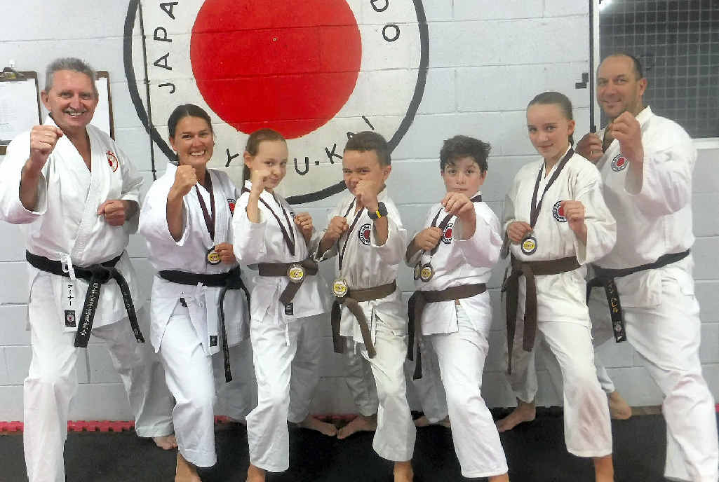 READY: (from left) Sensei Noel Turner, state referee Jacki Means, Kleo Isaac, Cyle Vollmar, Jayden Raucci, Emma Vollmar and state referee Shane Harelle. READY: (from left) Sensei Noel Turner, state referee Jacki Means, Kleo Isaac, Cyle Vollmar, Jayden Raucci, Emma Vollmar and state referee Shane Harelle.