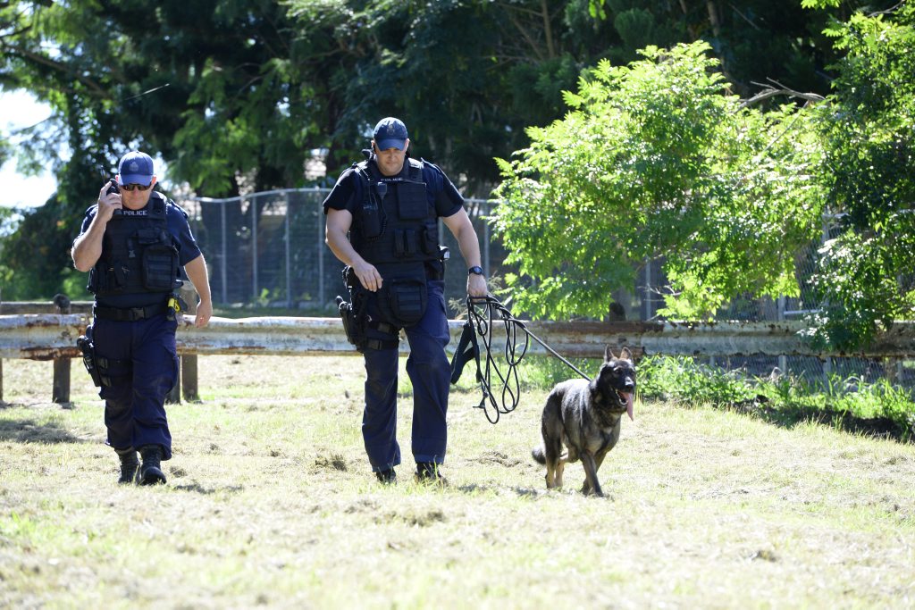 HOLD UP: Police search properties in Redbank Plains looking for a woman who robbed a bank. HOLD UP: Police search properties in Redbank Plains looking for a woman who robbed a bank.