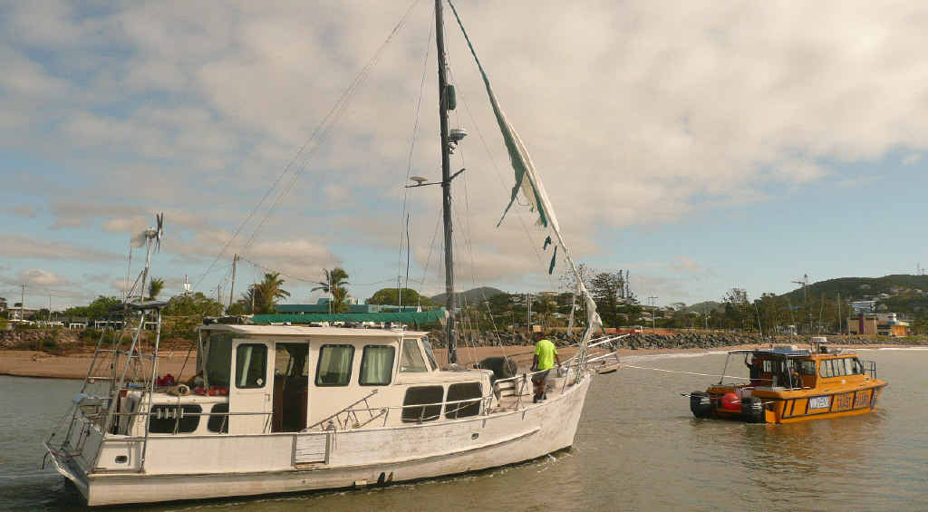 UNDER TOW: Yeppoon Coast Guard tows a boat stranded in Figtree Creek since Cyclone Marcia. UNDER TOW: Yeppoon Coast Guard tows a boat stranded in Figtree Creek since Cyclone Marcia.