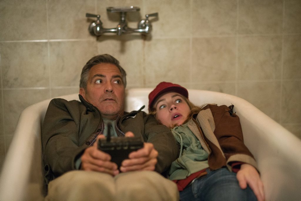 George Clooney and Britt Robertson in a scene from Tomorrowland. George Clooney and Britt Robertson in a scene from Tomorrowland.
