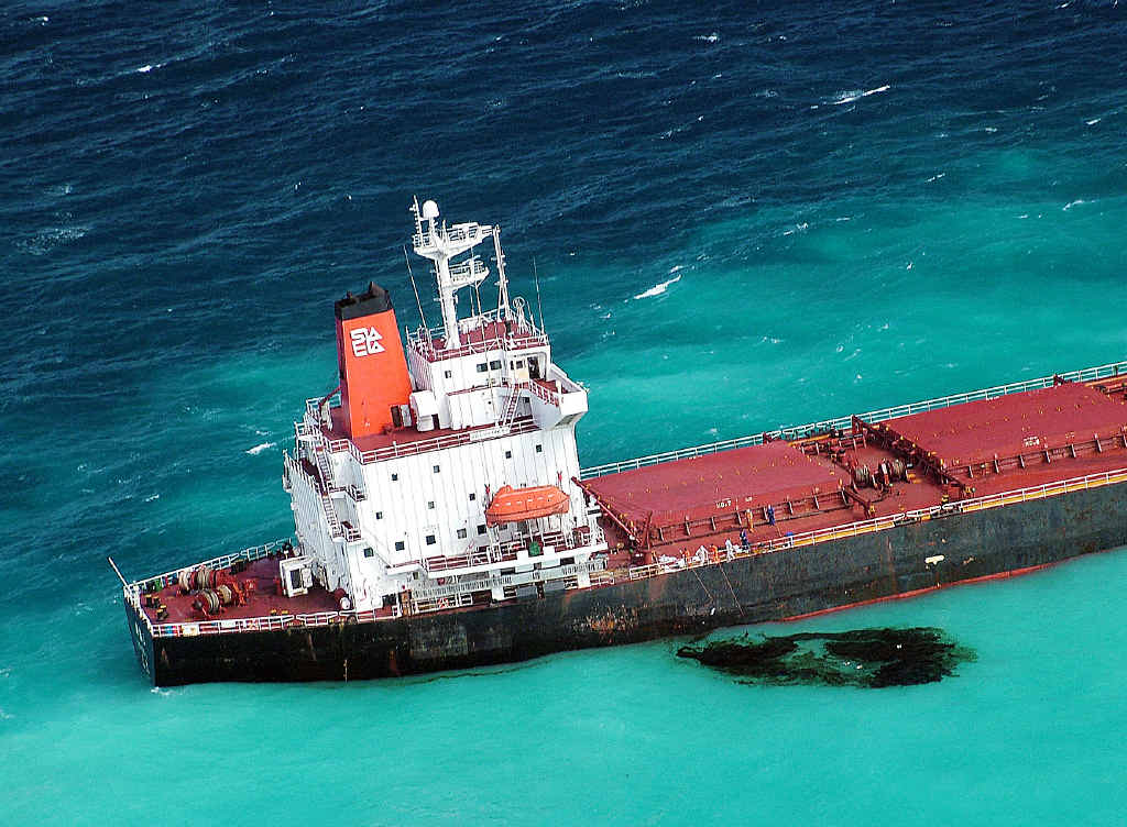 STIRRED UP: Chinese coal carrier Shen Neng 1 tries to break free from grounding on Douglas Shoal. STIRRED UP: Chinese coal carrier Shen Neng 1 tries to break free from grounding on Douglas Shoal.