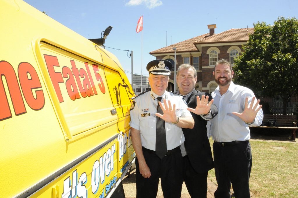 Assistant commissioner Southern Region Tony Wright, (left), Minister for Police and Community Safety, Jack Dempsey and Santos social performance manager John Phalen spreading the Fatal Five message.