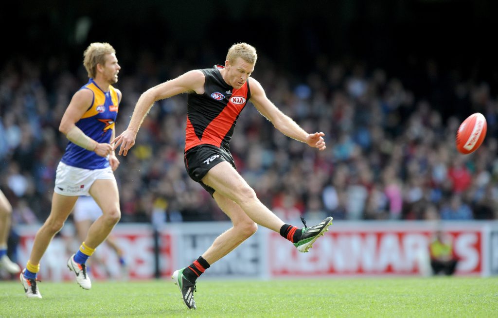 Dustin Fletcher of Essendon kicks forward, during the Round 20 AFL match between the Essendon Bombers and the West Coast Eagles at Etihad Stadium in Melbourne, Sunday, Aug. 11, 2013. (AAP Image/Joe Castro) NO ARCHIVING, EDITORIAL USE ONLY Dustin Fletcher of Essendon kicks forward, during the Round 20 AFL match between the Essendon Bombers and the West Coast Eagles at Etihad Stadium in Melbourne, Sunday, Aug. 11, 2013. (AAP Image/Joe Castro) NO ARCHIVING, EDITORIAL USE ONLY