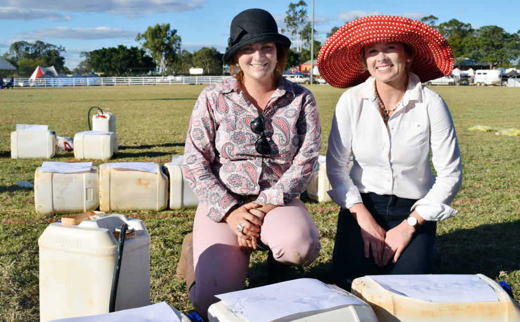 INNOVATIVE: Young Farmers Challenge organisers Zoe Rickertt and Ria Garside at the steer drenching station. INNOVATIVE: Young Farmers Challenge organisers Zoe Rickertt and Ria Garside at the steer drenching station.