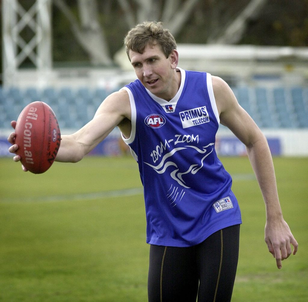 Canberra, July 25, 2003. AFL Kangaroo's player Matthew Burton before their match against Geelong at Manuka Oval in Canberra tomorrow. (AAP Image/Mark Graham) NO ARCHIVING Canberra, July 25, 2003. AFL Kangaroo's player Matthew Burton before their match against Geelong at Manuka Oval in Canberra tomorrow. (AAP Image/Mark Graham) NO ARCHIVING