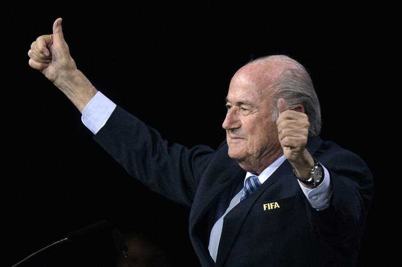 FIFA president Sepp Blatter gestures after his re-election during the 65th FIFA Congress held at the Hallenstadion in Zurich, Switzerland, Friday, May 29, 2015. FIFA president Sepp Blatter gestures after his re-election during the 65th FIFA Congress held at the Hallenstadion in Zurich, Switzerland, Friday, May 29, 2015.