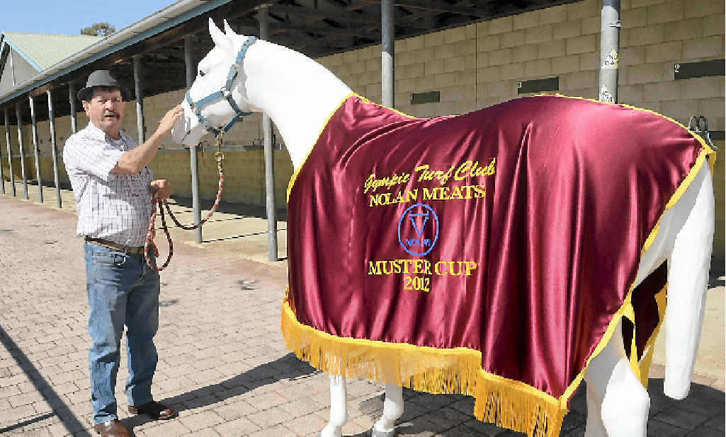 QUIET HORSE: Gympie Racing club steward John Cartwright, seen here with White Caviar, got a trainer’s licence to prepare Dark Briar. QUIET HORSE: Gympie Racing club steward John Cartwright, seen here with White Caviar, got a trainer’s licence to prepare Dark Briar.