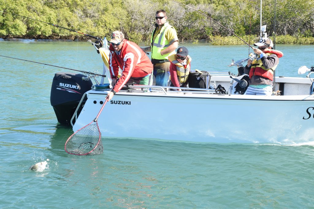 FISH FIGHT: Craig Allan helps his son Lachlan reel in his first bream of the competition. FISH FIGHT: Craig Allan helps his son Lachlan reel in his first bream of the competition.
