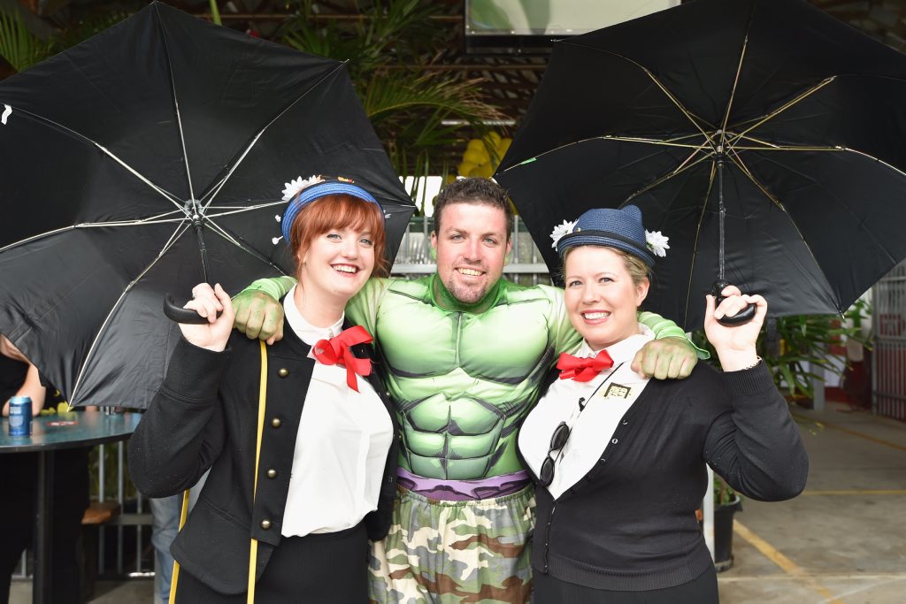 PubFest - (L) Erin Musgrave and Crystal Pearson catch up with the Hulk Darryl Finlay at the Aussie Hotel. Photo: Alistair Brightman / Fraser Coast Chronicle