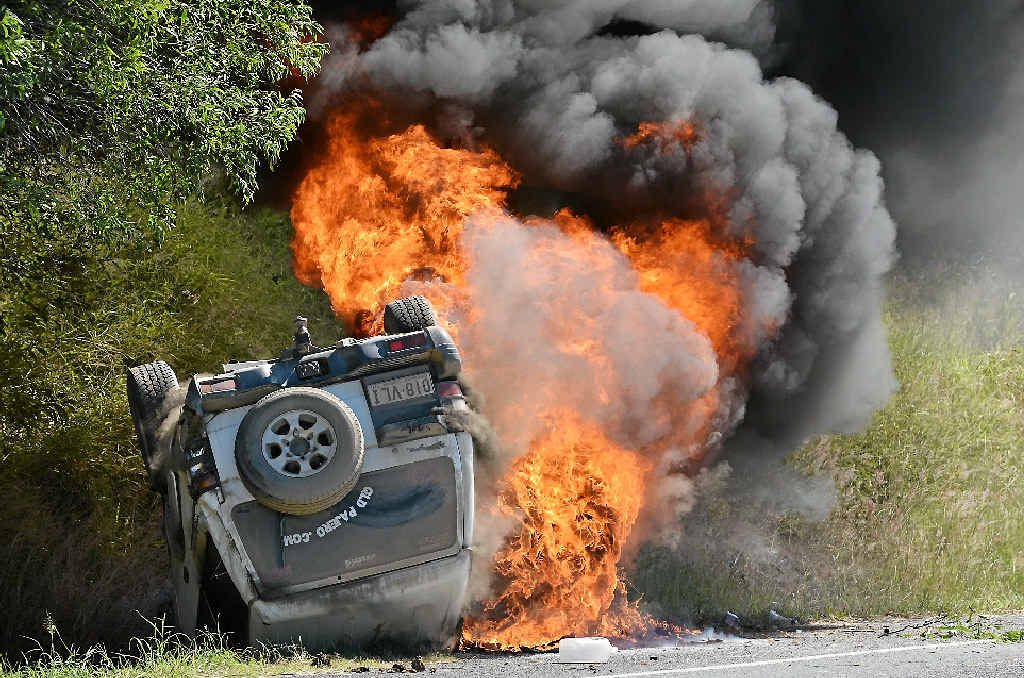 LUCKY ESCAPE: The crash scene after passers-by pulled the mother and her two children from the overturned car. LUCKY ESCAPE: The crash scene after passers-by pulled the mother and her two children from the overturned car.