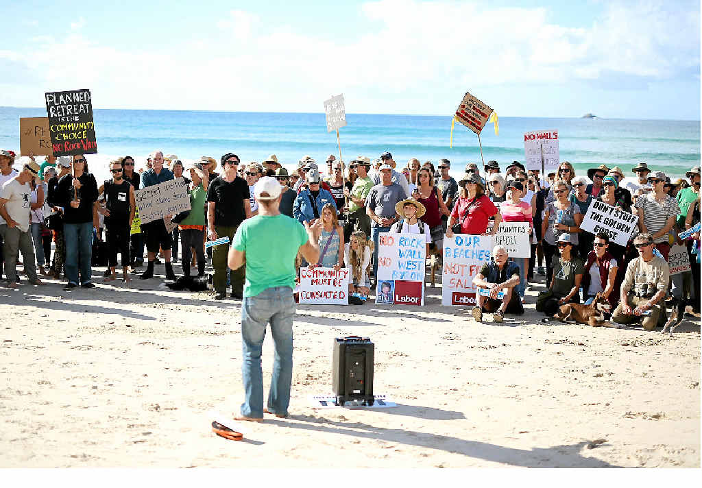 SPEAK UP: Councillor Duncan Dey addresses residents who turned out yesterday to protest a rock wall proposed to be built at Belongil. SPEAK UP: Councillor Duncan Dey addresses residents who turned out yesterday to protest a rock wall proposed to be built at Belongil.