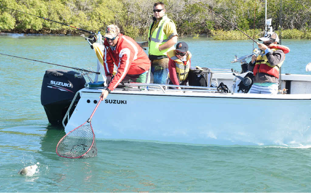 FISH FIGHT: Craig Allan helps his son Lachlan reel in his first bream of the competition. FISH FIGHT: Craig Allan helps his son Lachlan reel in his first bream of the competition.