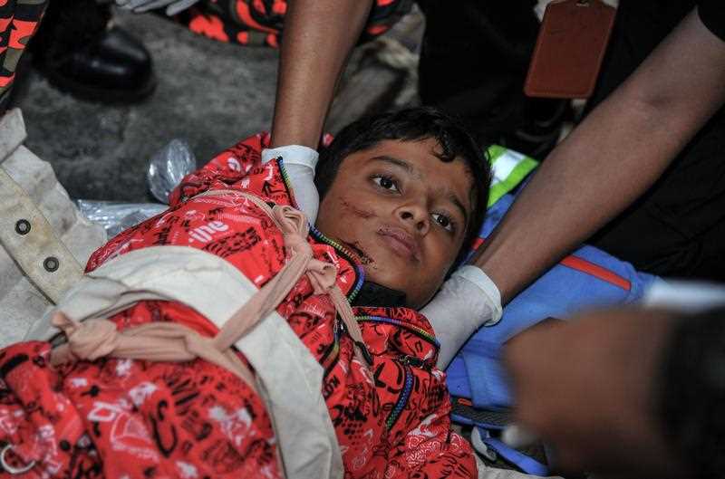 A strong earthquake that jolted Malaysia's Mount Kinabalu killed at least 11 people and left another 8 missing, an official said, as authorities continued to search for survivors on Southeast Asia's highest peak. A strong earthquake that jolted Malaysia's Mount Kinabalu killed at least 11 people and left another 8 missing, an official said, as authorities continued to search for survivors on Southeast Asia's highest peak.