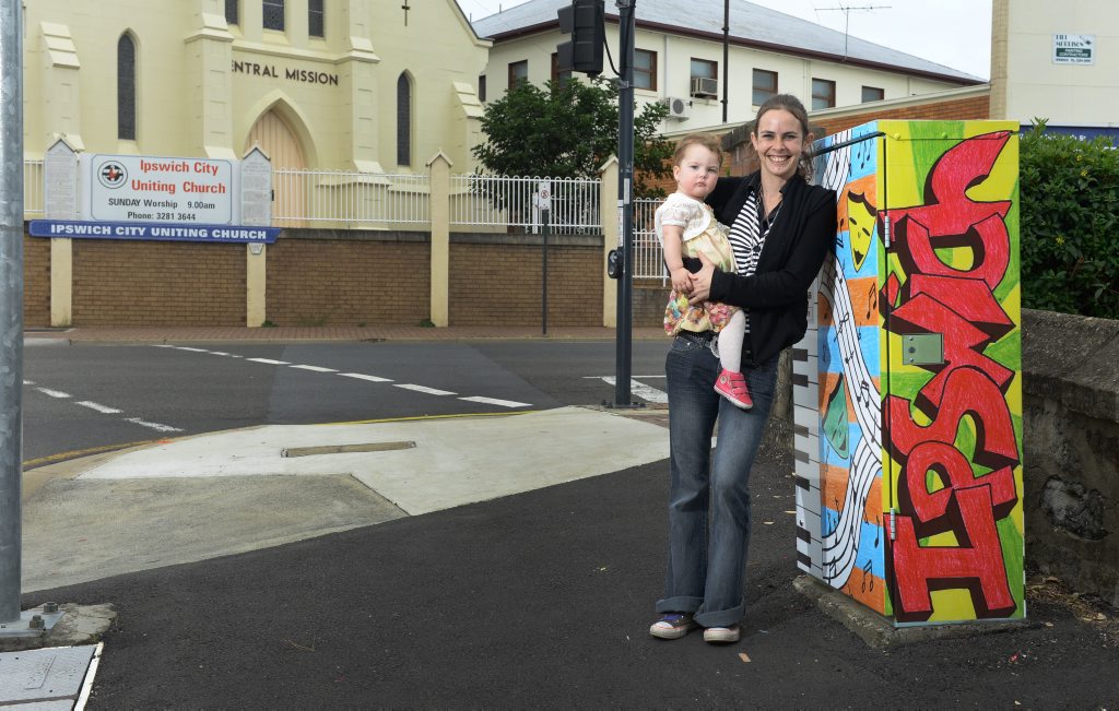 Kerry Laurent, with daughter Jayda Laurent-Roskam, is one of 40 local artists to have their art feature on traffic signal boxes around Ipswich. Kerry Laurent, with daughter Jayda Laurent-Roskam, is one of 40 local artists to have their art feature on traffic signal boxes around Ipswich.
