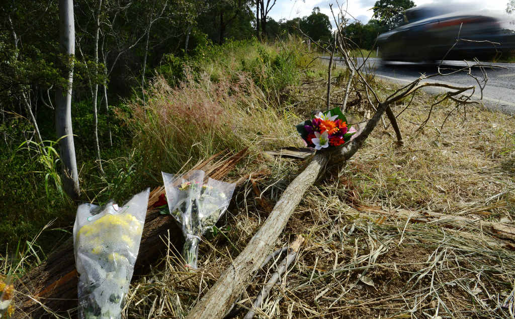 TRIBUTE: Flowers left at the scene of last week’s fatal crash site on the Rosewood-Laidley Road near Grandchester. Local residents are asking for the speed limit along the road to be lowered. TRIBUTE: Flowers left at the scene of last week’s fatal crash site on the Rosewood-Laidley Road near Grandchester. Local residents are asking for the speed limit along the road to be lowered.