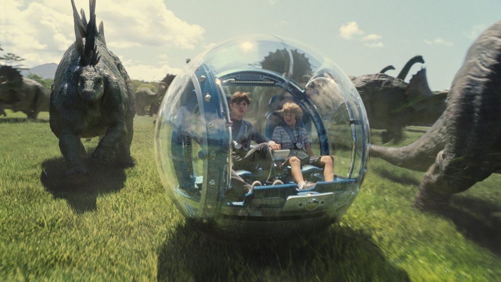 Nick Robinson and Ty Simpkins in a scene from the movie Jurassic World. Nick Robinson and Ty Simpkins in a scene from the movie Jurassic World.