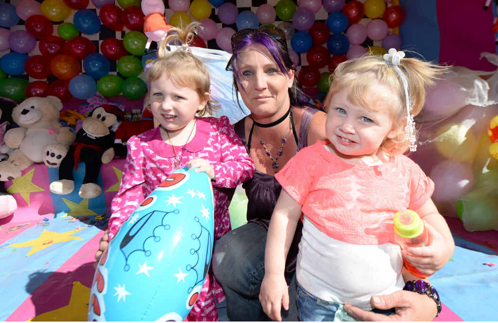 BIG DAY OUT: Amanda Sollitt with daughters Jenniffer, 4, and Alexis, 2, at the 2015 Yeppoon Show. BIG DAY OUT: Amanda Sollitt with daughters Jenniffer, 4, and Alexis, 2, at the 2015 Yeppoon Show.