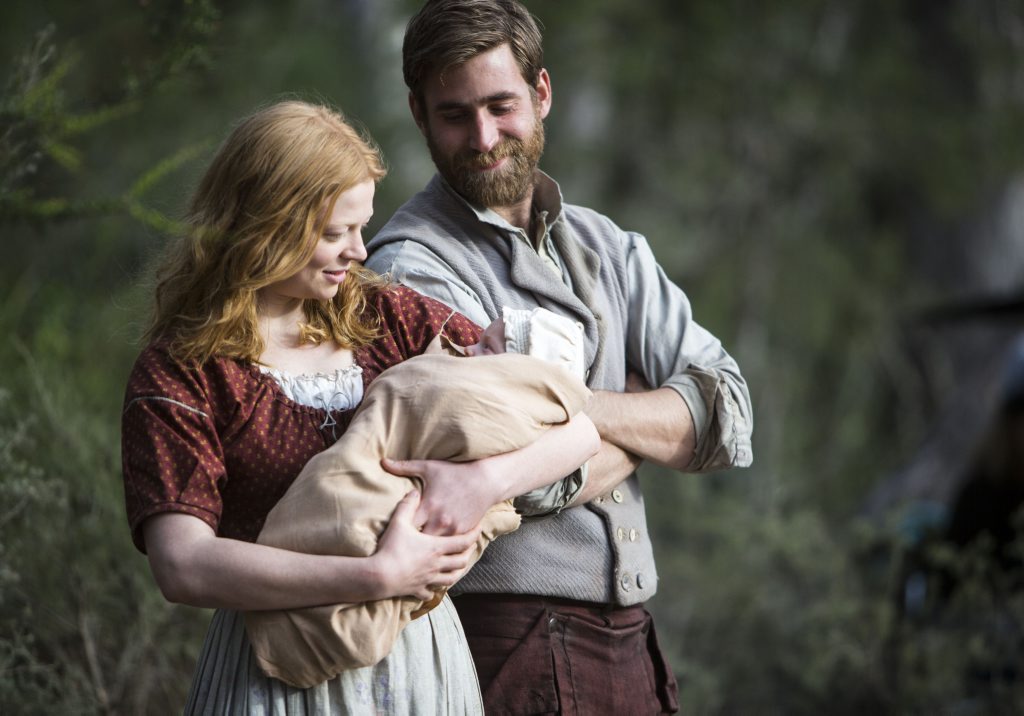 Sarah Snook and Oliver Jackson-Cohen in a scene from the TV mini-series The Secret River. Sarah Snook and Oliver Jackson-Cohen in a scene from the TV mini-series The Secret River.