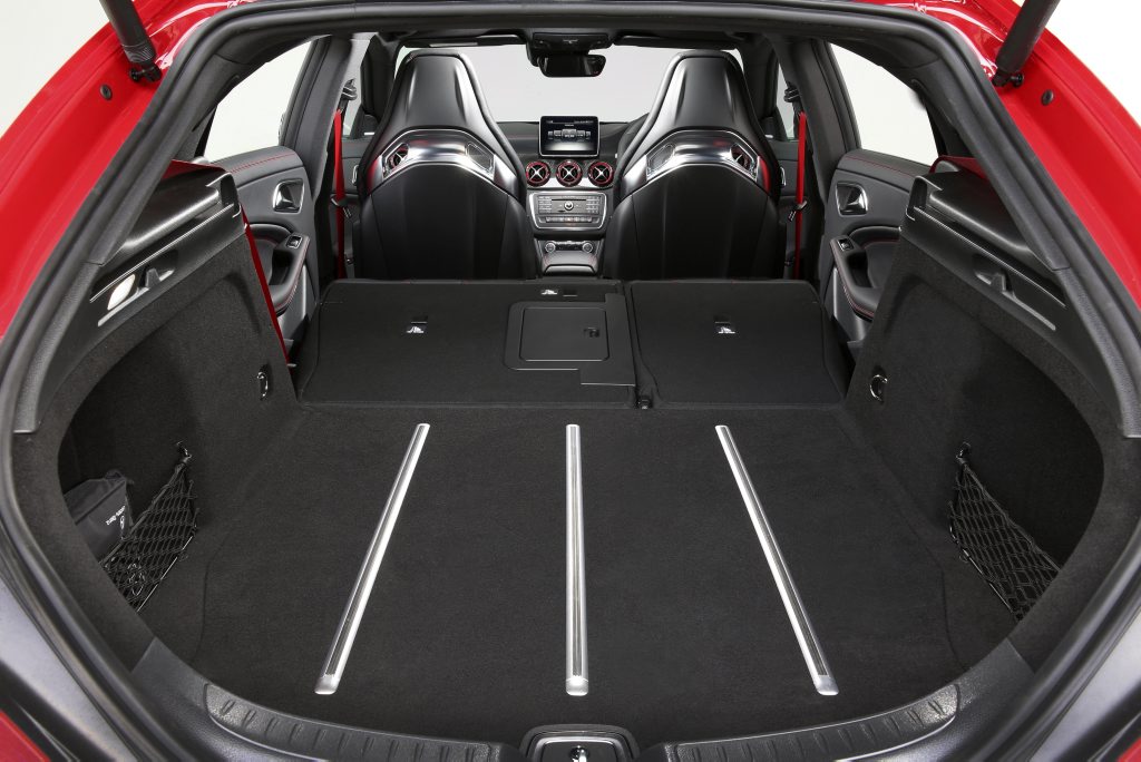 OPENED UP: Rear cargo area shape not as useful as a boxy old traditional wagon's. Prettier though. OPENED UP: Rear cargo area shape not as useful as a boxy old traditional wagon's. Prettier though.