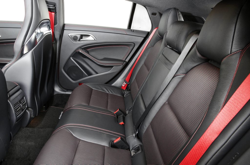 OUT BACK: Rear seats offer a touch more headroom than the CLA four-door coupe, but still a bit claustrophobic back here OUT BACK: Rear seats offer a touch more headroom than the CLA four-door coupe, but still a bit claustrophobic back here