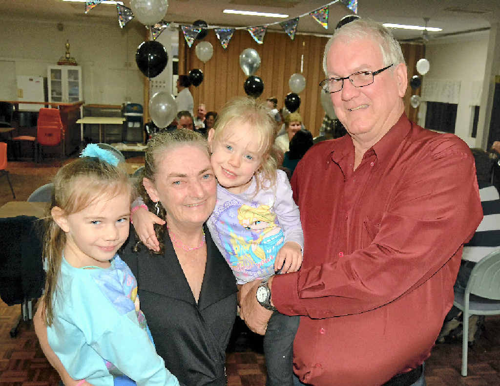 JOINT CELEBRATION: Christine and Bill Parker with two of their grandchildren Ashlee, 5, and Emily, 3, at the couple’s joint 60th birthday celebration. JOINT CELEBRATION: Christine and Bill Parker with two of their grandchildren Ashlee, 5, and Emily, 3, at the couple’s joint 60th birthday celebration.