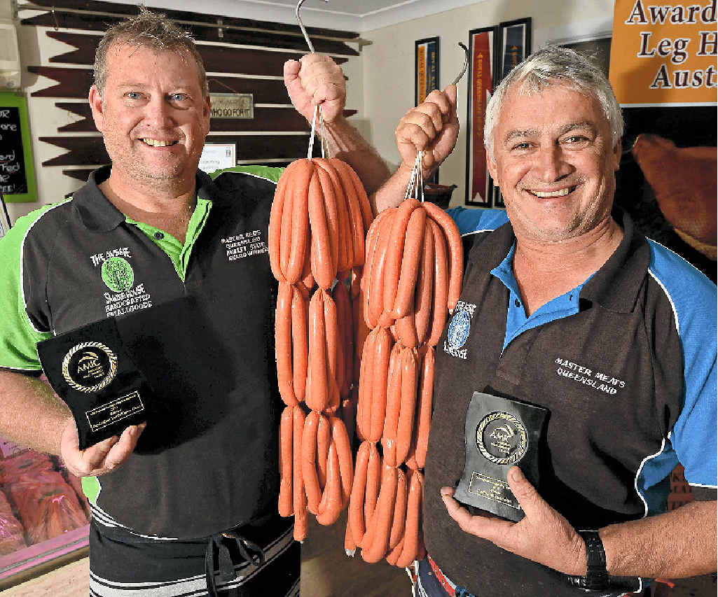 TASTING SUCCESS: Co-owners Paul Rae and Rob Glenny of Aussie Smokehouse, Warana, have cleaned up at the Sunshine Coast and Burnett region Sausage King and Best Butcher’s Burger Competition. TASTING SUCCESS: Co-owners Paul Rae and Rob Glenny of Aussie Smokehouse, Warana, have cleaned up at the Sunshine Coast and Burnett region Sausage King and Best Butcher’s Burger Competition.