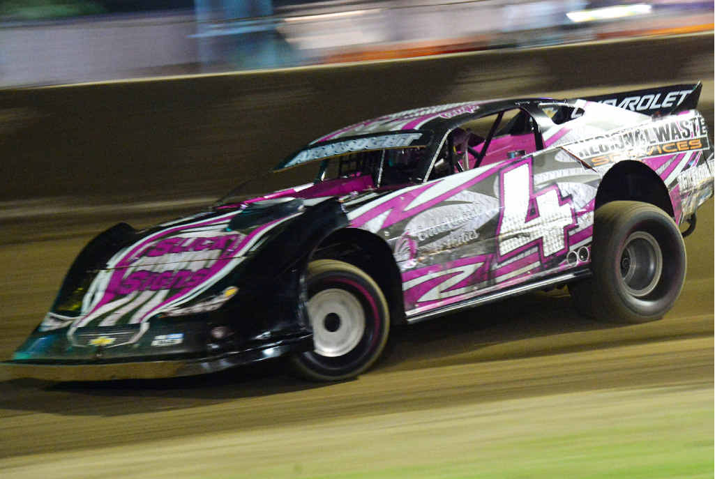 SHOW STOPPER: Lee Williams in a super sedan heat at Rockhampton Show Speedway last Friday night. The local driver had a ding-dong battle with brother Matty. SHOW STOPPER: Lee Williams in a super sedan heat at Rockhampton Show Speedway last Friday night. The local driver had a ding-dong battle with brother Matty.