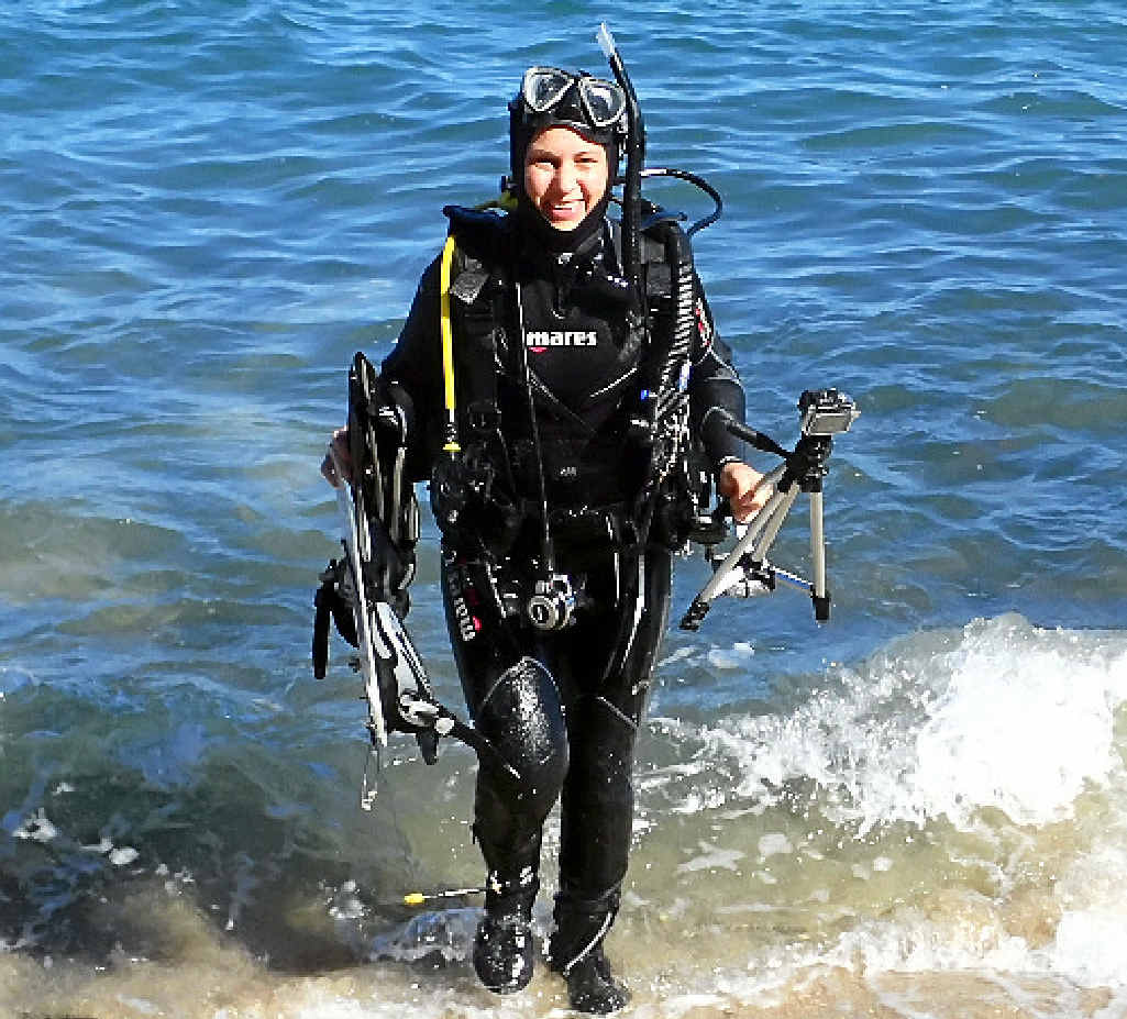 DEEP END: Dr Anna Scott, from Southern Cross University’s National Marine Science Centre returns from a dive. DEEP END: Dr Anna Scott, from Southern Cross University’s National Marine Science Centre returns from a dive.