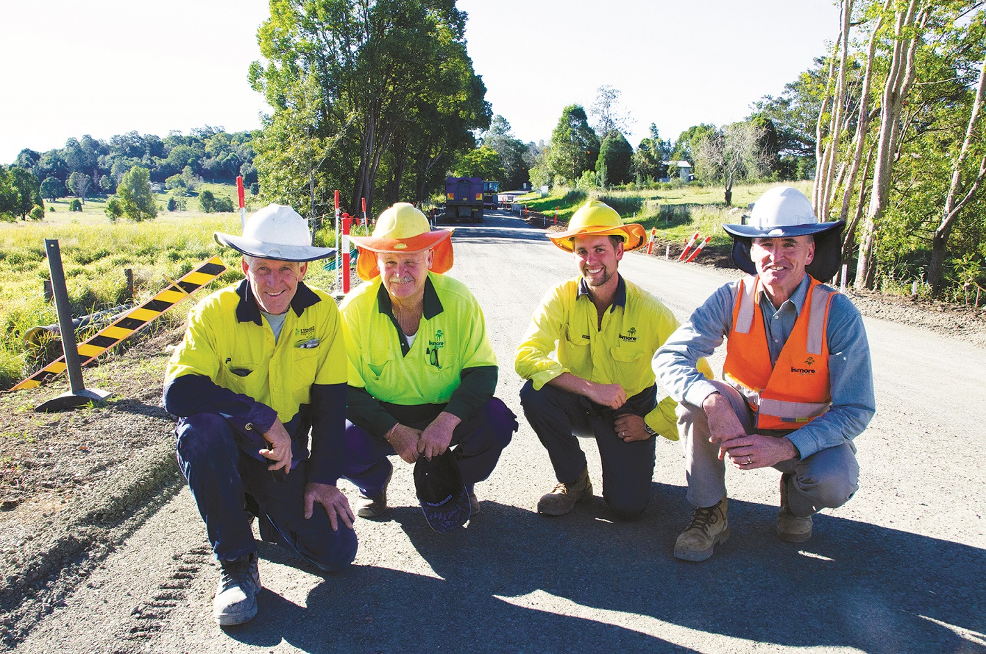 Working on-site at Numulgi laying the first road containing glass sand are (l-r) Ian Collins, Warren Watts, Coady Capello and Peter Brewer-Charles.
Working on-site at Numulgi laying the first road containing glass sand are (l-r) Ian Collins, Warren Watts, Coady Capello and Peter Brewer-Charles.