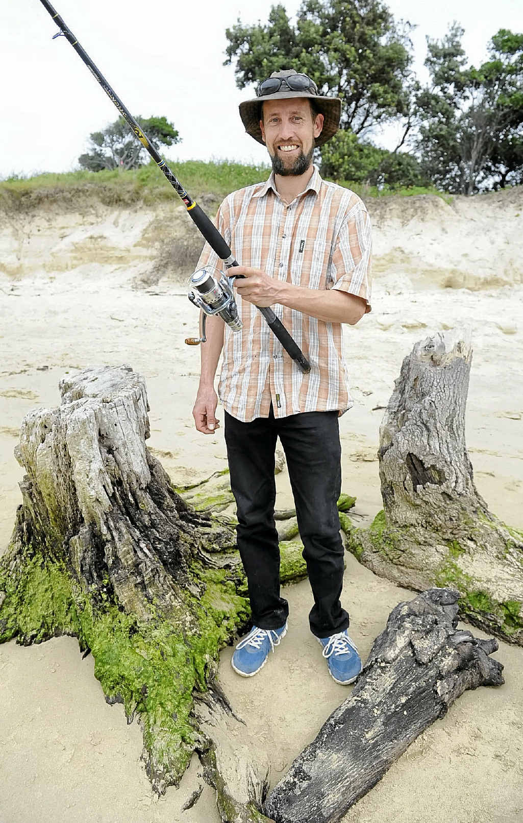 WORTH THE TRIP: Timo Ploschke of Victoria is fishing at Whiting Beach in Yamba. PHOTO: DEBRAH NOVAK WORTH THE TRIP: Timo Ploschke of Victoria is fishing at Whiting Beach in Yamba. PHOTO: DEBRAH NOVAK