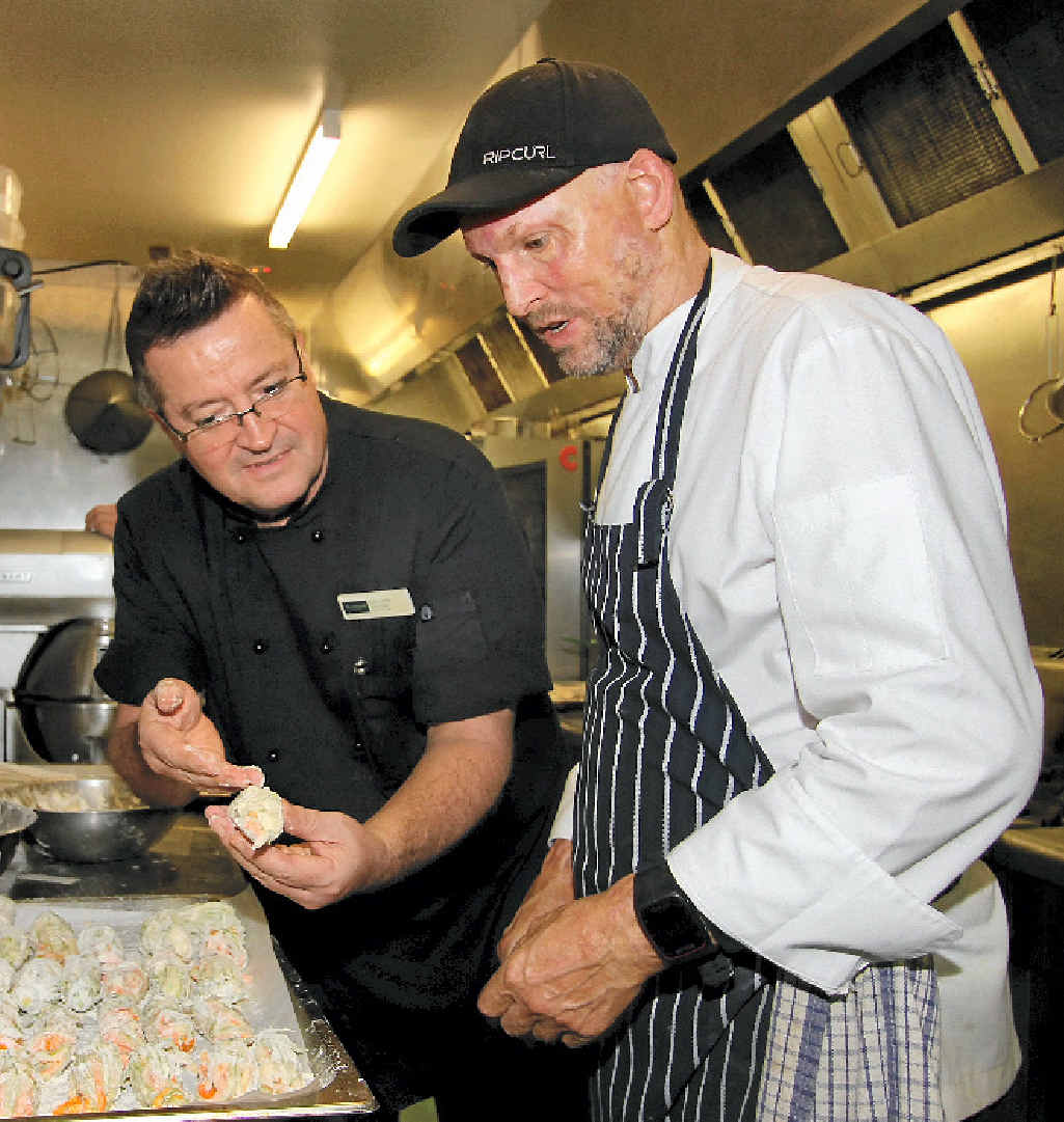 IN THE KITCHEN: Peppers Airlie Beach executive chef Greg Devine and celebrity chef Matt Golinski, creating gourmet canapes from local produce. Photo Sharon Smallwood IN THE KITCHEN: Peppers Airlie Beach executive chef Greg Devine and celebrity chef Matt Golinski, creating gourmet canapes from local produce. Photo Sharon Smallwood