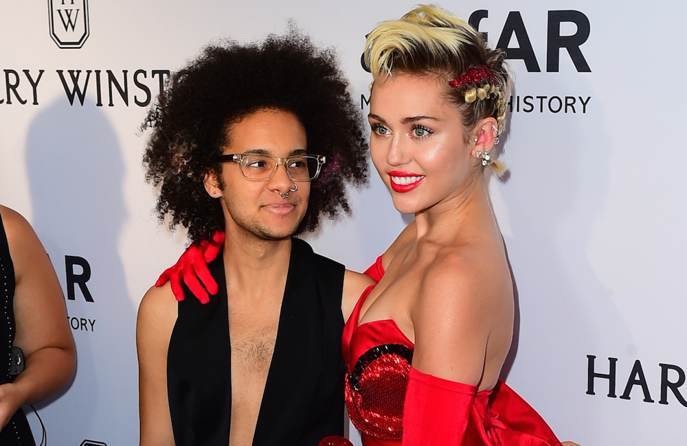 Tyler Ford and Miley Cyrus at the amfAR Inspiration Gala Tyler Ford and Miley Cyrus at the amfAR Inspiration Gala