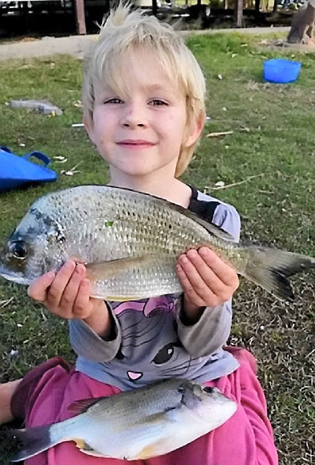 KEEPERS: Alex Kelly with the bream she caught recently. KEEPERS: Alex Kelly with the bream she caught recently.