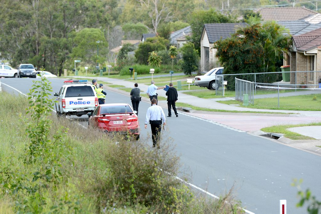 Police shut down Albert Street in Goodna after a fight that left one man fighting for his life. Photo: Kate Czerny / The Queensland Times Police shut down Albert Street in Goodna after a fight that left one man fighting for his life. Photo: Kate Czerny / The Queensland Times