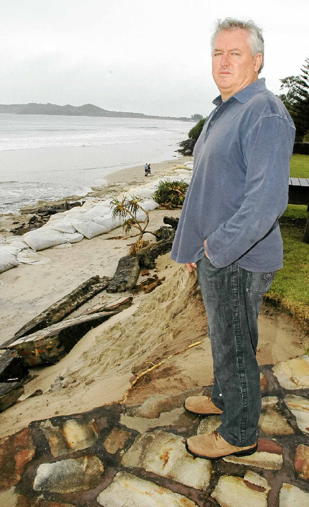 LONG HISTORY: Belongil Beach resident John Vaughan at his erosion-damaged property. LONG HISTORY: Belongil Beach resident John Vaughan at his erosion-damaged property.