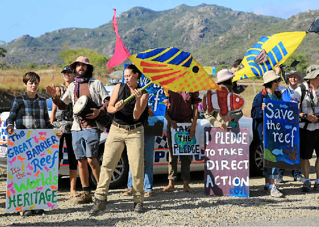 COAL FACE: About 15 locals joined the 100 or so protesters who took their reef fight to Adani’s gate this week. COAL FACE: About 15 locals joined the 100 or so protesters who took their reef fight to Adani’s gate this week.